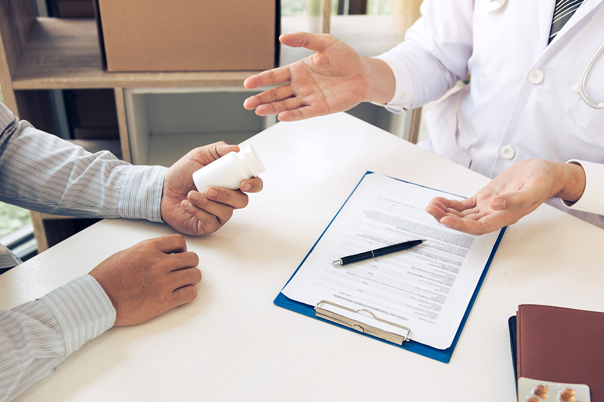 doctor explaining methadone treatment to patient